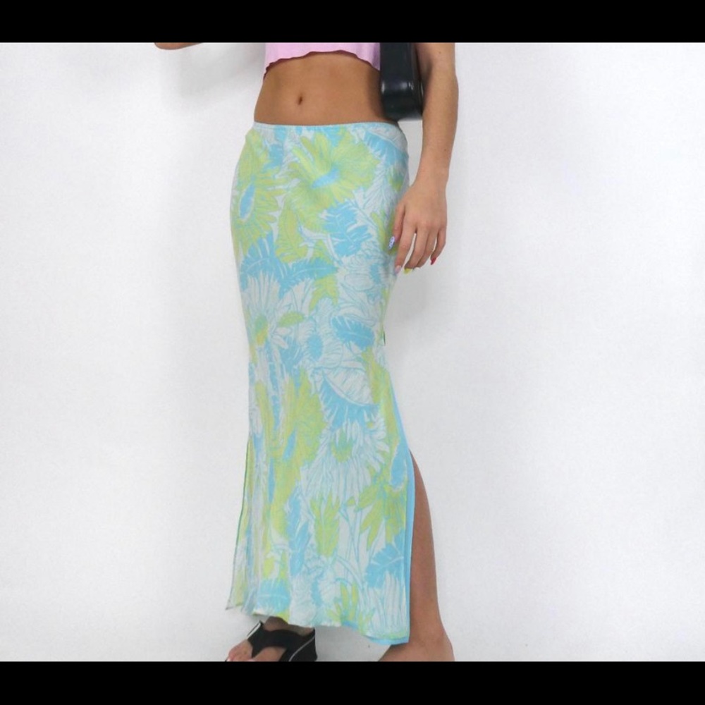 Express green and blue ferns long skirt with blue lining. Size medium.